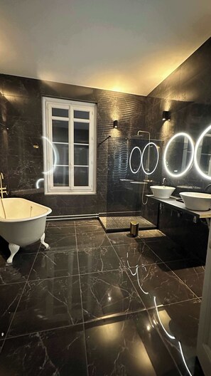 Shower, hair dryer, towels, shampoo