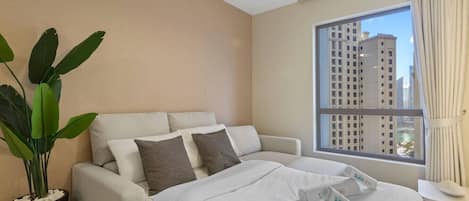 1 bedroom, desk, iron/ironing board, travel crib