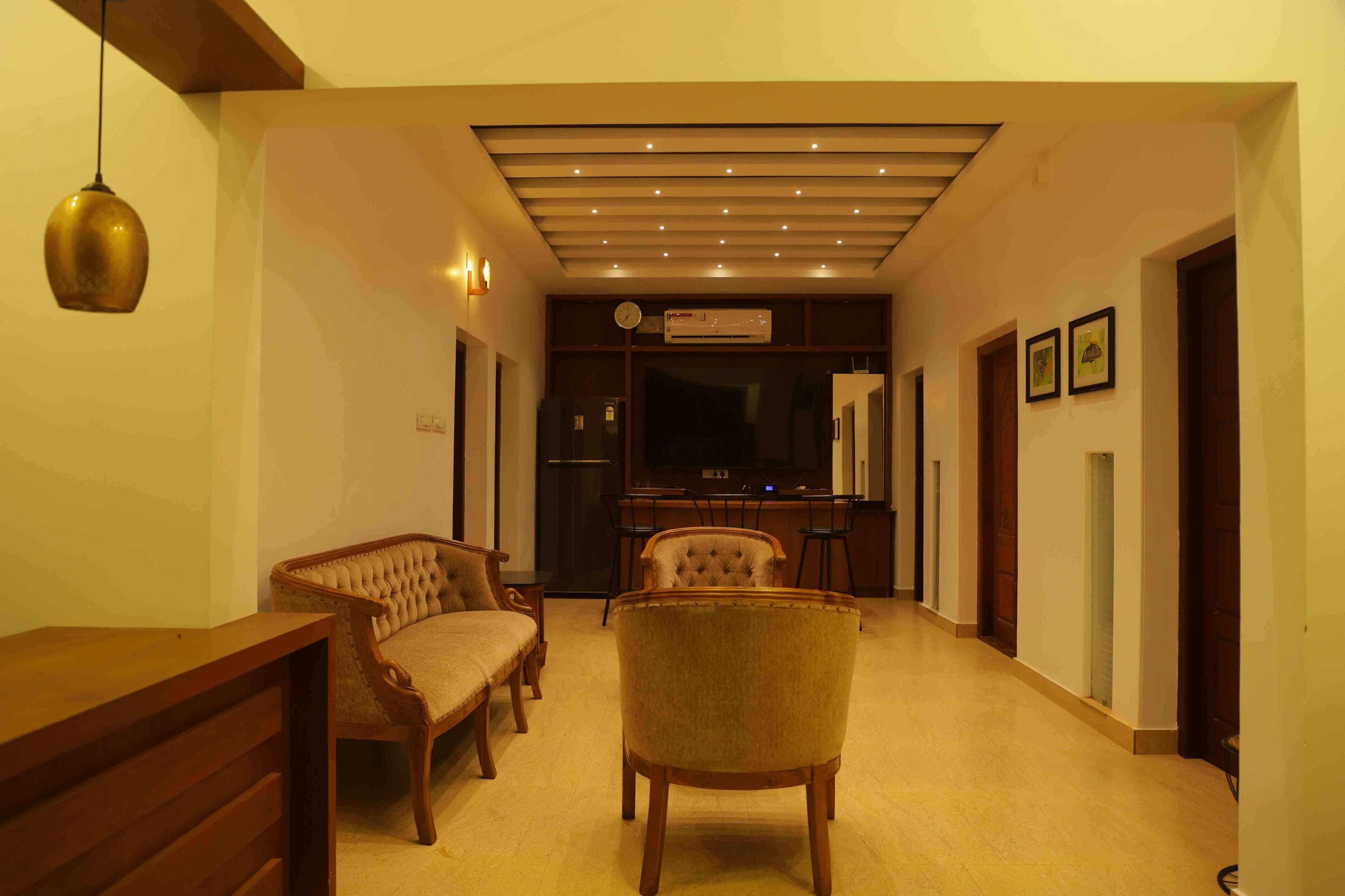 Birdwing Farmhouse | Living area | 32-inch LED TV with digital channels