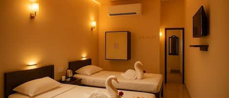 Executive Triple Room | Premium bedding, desk, soundproofing, cots/infant beds