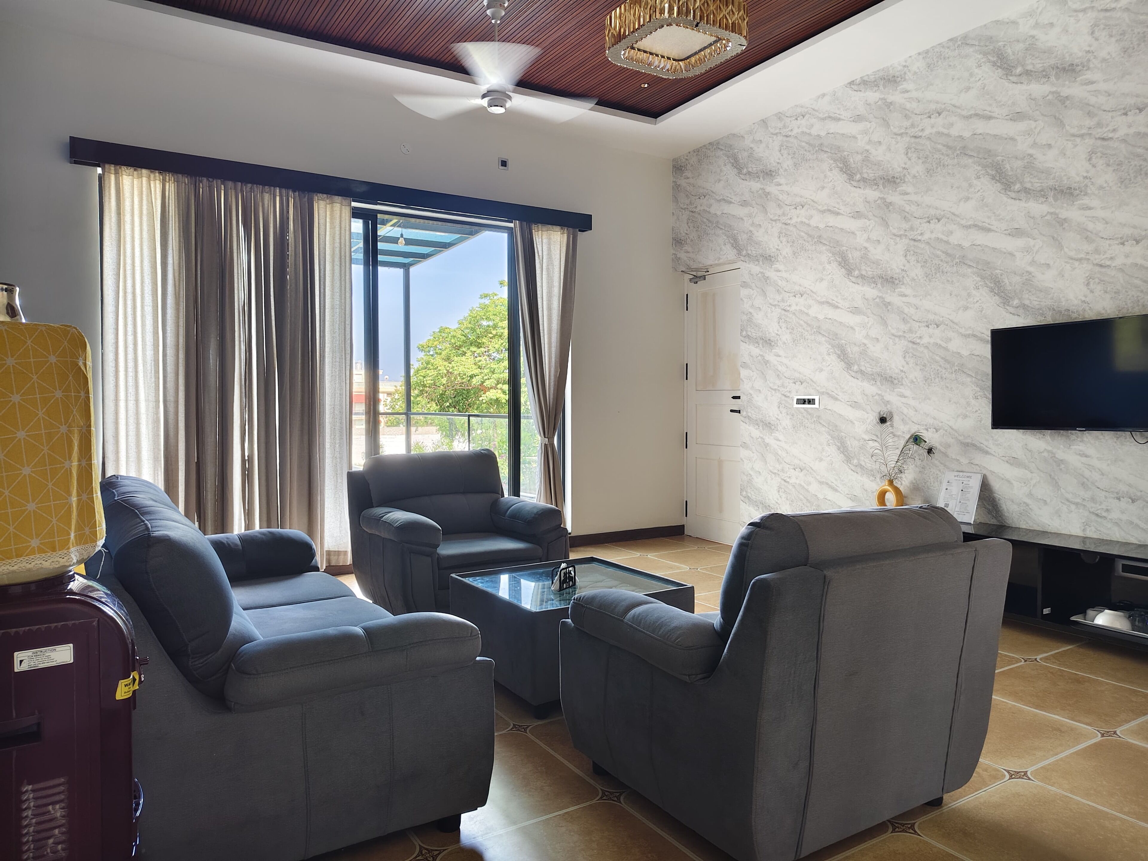 Luxury Suite | Living area | 40-inch Smart TV with digital channels