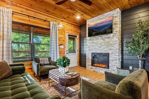 TV, fireplace - Grand Highland: 4BR Luxe Pool Cabin* Hot Tub*MTN Views*Games (Sevierville)