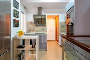 Departamento, 1 habitación, balcón, vista a la ciudad | Cocina privada