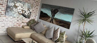 Safe and secure Wild olive apartments. 2 minutes walk to the mall and Hospital 