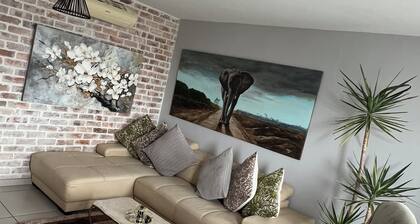 Safe and secure Wild olive apartments. 2 minutes walk to the mall and Hospital