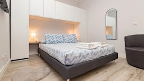 1 habitación, tabla de planchar con plancha, wifi gratis y ropa de cama 