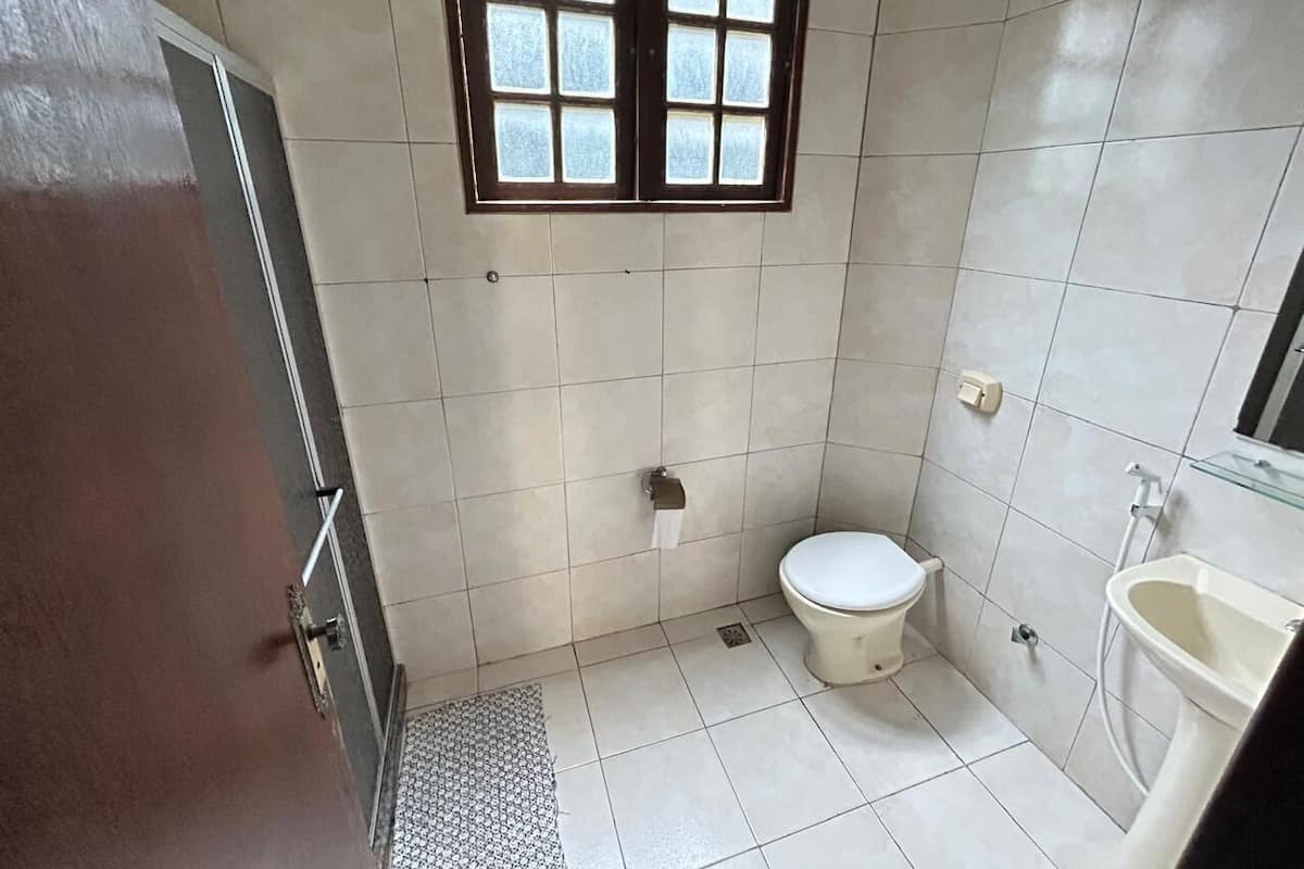 Shower, towels, soap, toilet paper