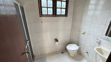 Shower, towels, soap, toilet paper