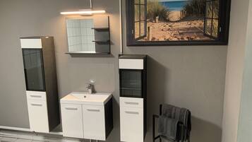 Hair dryer, towels, soap, shampoo