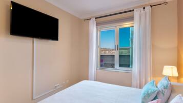 2 dormitorios, tabla de planchar con plancha, wifi gratis y ropa de cama