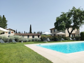 Seasonal outdoor pool, pool umbrellas, sun loungers