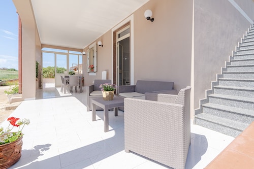 Villa 'Con Tre Camere Da Letto' con terrazza privata, giardino in comune e aria condizionata