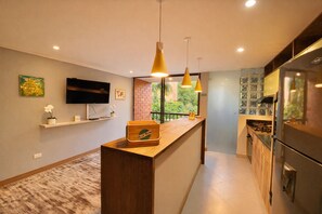 Fridge, microwave, stovetop, cookware/dishes/utensils