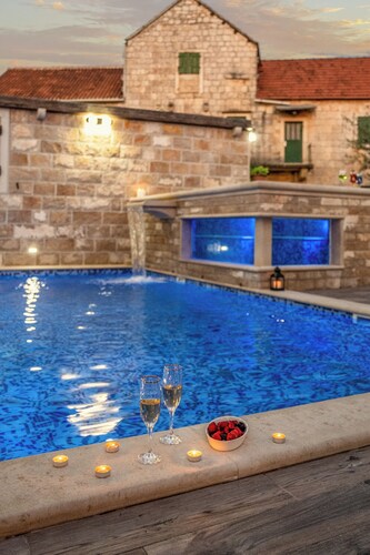 Luxury Villa David with private boat, heated pool, whirlpool and sauna