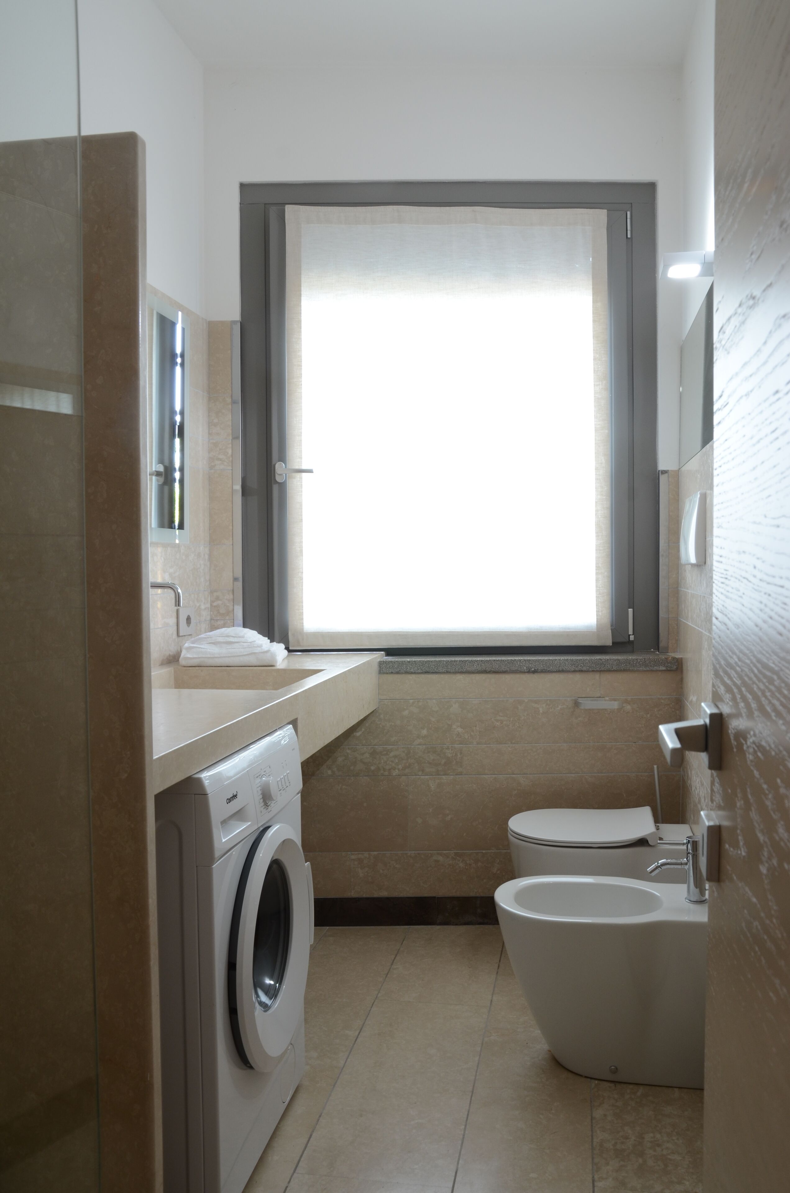 Hair dryer, bidet, towels, soap