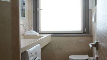 Hair dryer, bidet, towels, soap
