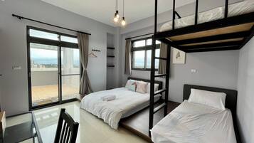 Economy Triple Room, Multiple Beds, Non Smoking, Mountain View | Blackout curtains