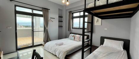 Economy Triple Room, Multiple Beds, Non Smoking, Mountain View | Blackout drapes