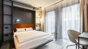 Desk, free WiFi, bed sheets
