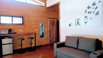 Superior Cottage, 1 Queen Bed with Sofa bed, River View | Living area | TV