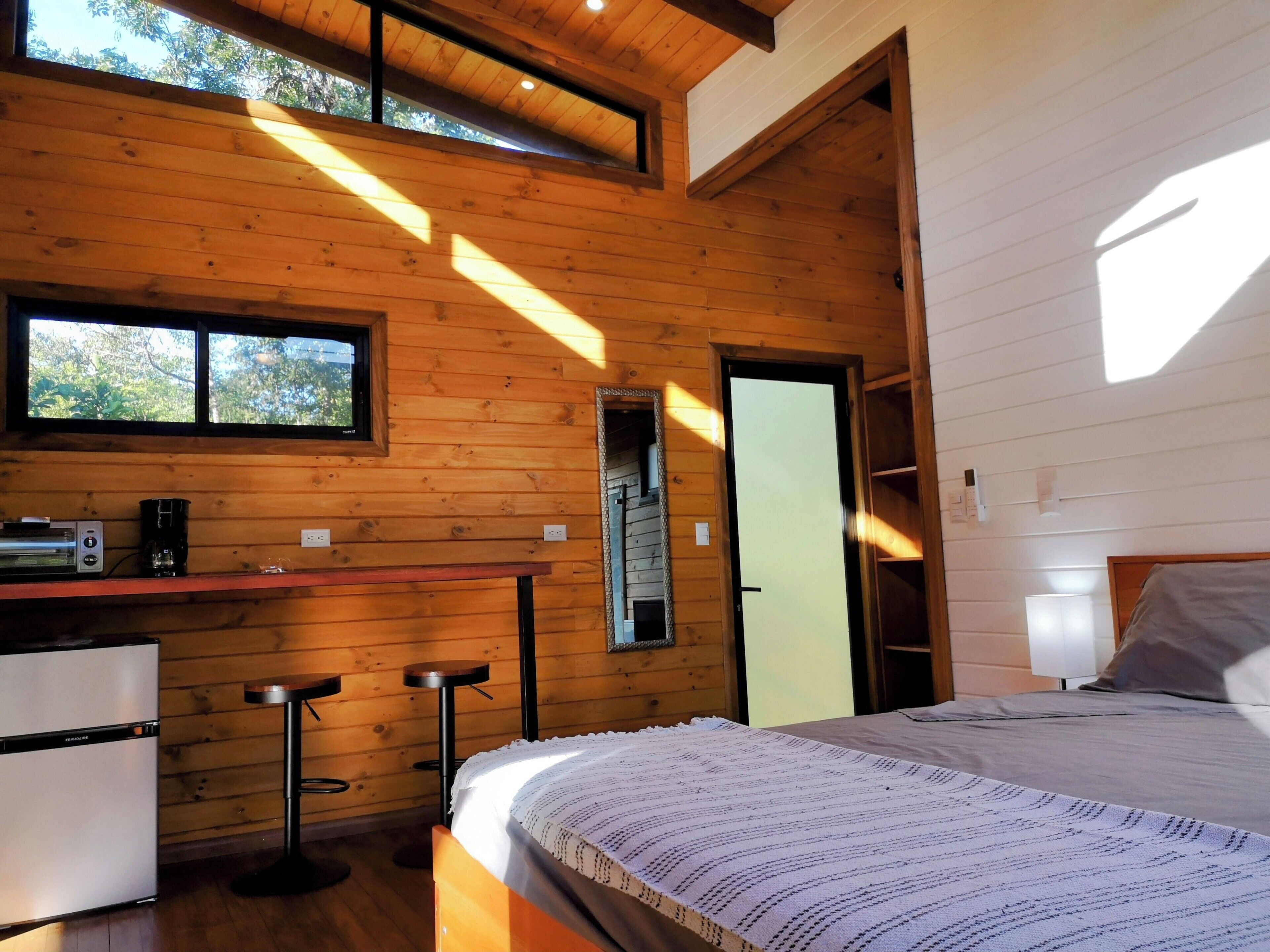 Standard Cottage, 1 Queen Bed, River View | 1 bedroom, laptop workspace, free WiFi