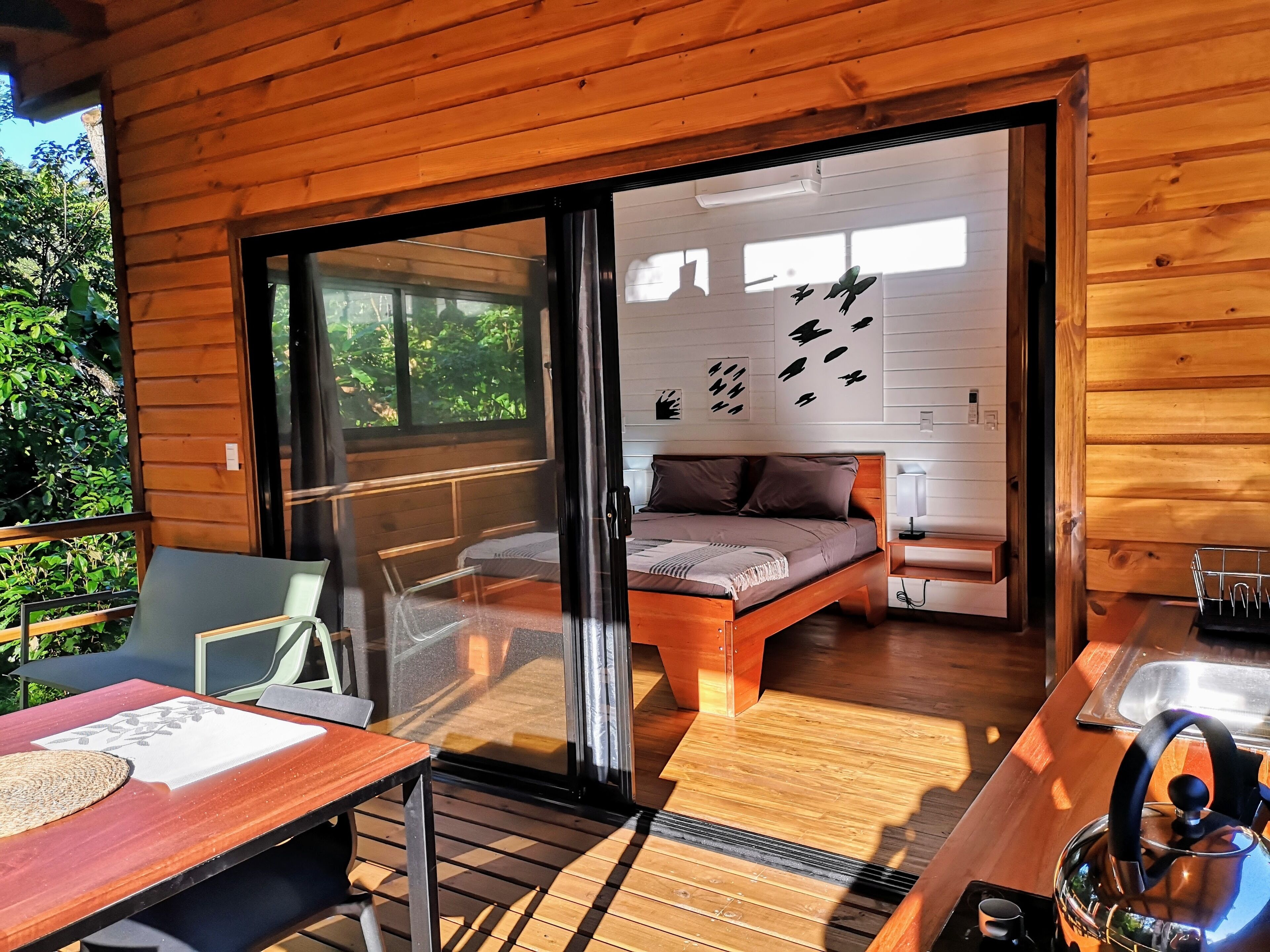 Standard Cottage, 1 Queen Bed, River View | 1 bedroom, laptop workspace, free WiFi