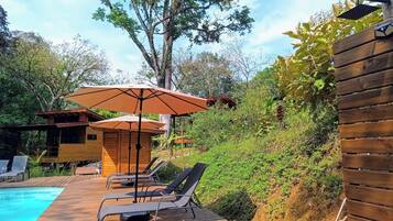 Outdoor pool, pool umbrellas, sun loungers