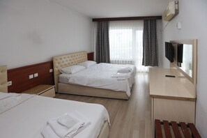 Fer et planche à repasser, Wi-Fi gratuit, draps fournis