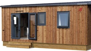 A wooden cabin with a sliding door and a window, labeled "RAPIDHOME". - ZEcamping 4 étoiles animé 500m plage piscine couverte mobil-home 25m2 (Morsalines)