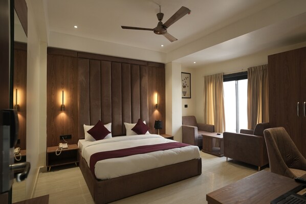 Deluxe Double Room, City View | Desk, laptop workspace, soundproofing, iron/ironing board - Hotel SS4 Crystals (Lucknow)