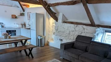 Deluxe Cottage, Non Smoking, Kitchenette | Living area | LED TV