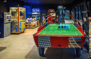 Enjoy a game of pool or challenge friends to a round of Double Pong in this lively entertainment space.