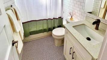 Hair dryer, towels, soap, shampoo