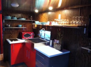 Fridge, microwave, stovetop, coffee/tea maker