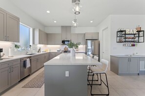 Fridge, microwave, oven, stovetop - Desert Escape. New Luxury Pool Home! Walk to Coachella! (Indio)