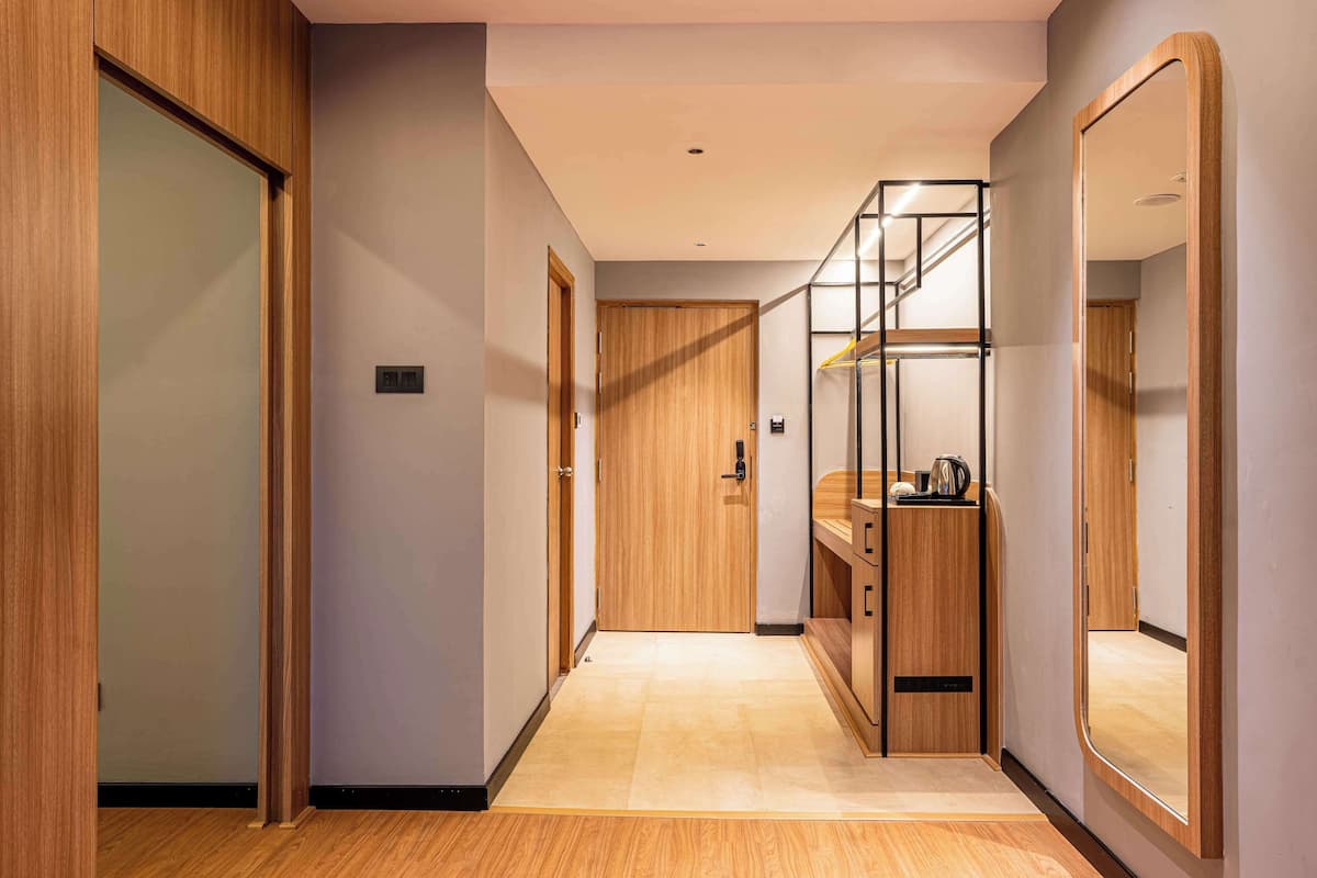 Suite | 1 habitación, minibar y tabla de planchar con plancha