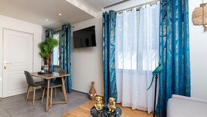 Deluxe Studio, Ensuite (Bord De Plage) | In-room safe, desk, laptop workspace, blackout curtains - Furnished Studio La Jungle Suite, Mandara Beach (Antibes)