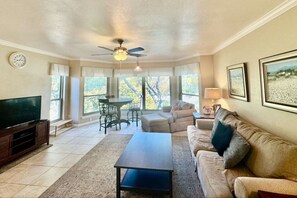 TV, books - Cozy Up on the Comal River | DOWNTOWN (New Braunfels)