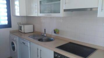 Apartment | Private kitchen | Fridge, microwave, oven, stovetop