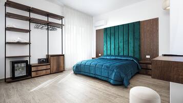 Suite junior, 1 cama Queen size y sofá cama, para no fumadores, vista al jardín | 1 habitación, escritorio y espacio para trabajar con laptop