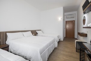 Deluxe Quadruple Room, 1 Bedroom, Non Smoking, Garden View | Desk, laptop workspace, blackout drapes, soundproofing