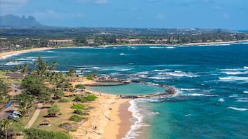 On the beach, sun-loungers, beach towels