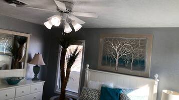 1 bedroom, desk, iron/ironing board, travel crib