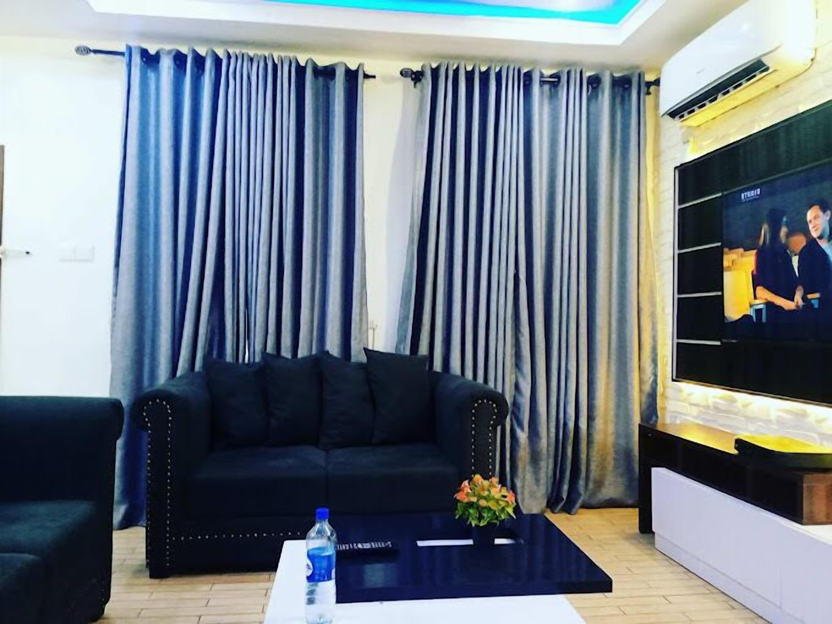 Appartement Économique, balcon, vue ville | Coin séjour