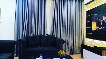 Appartement Ăconomique, balcon, vue ville | Coin sĂ©jour