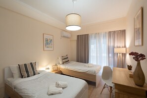 2 quartos, ferros/tábuas de passar roupa, Wi-Fi de cortesia