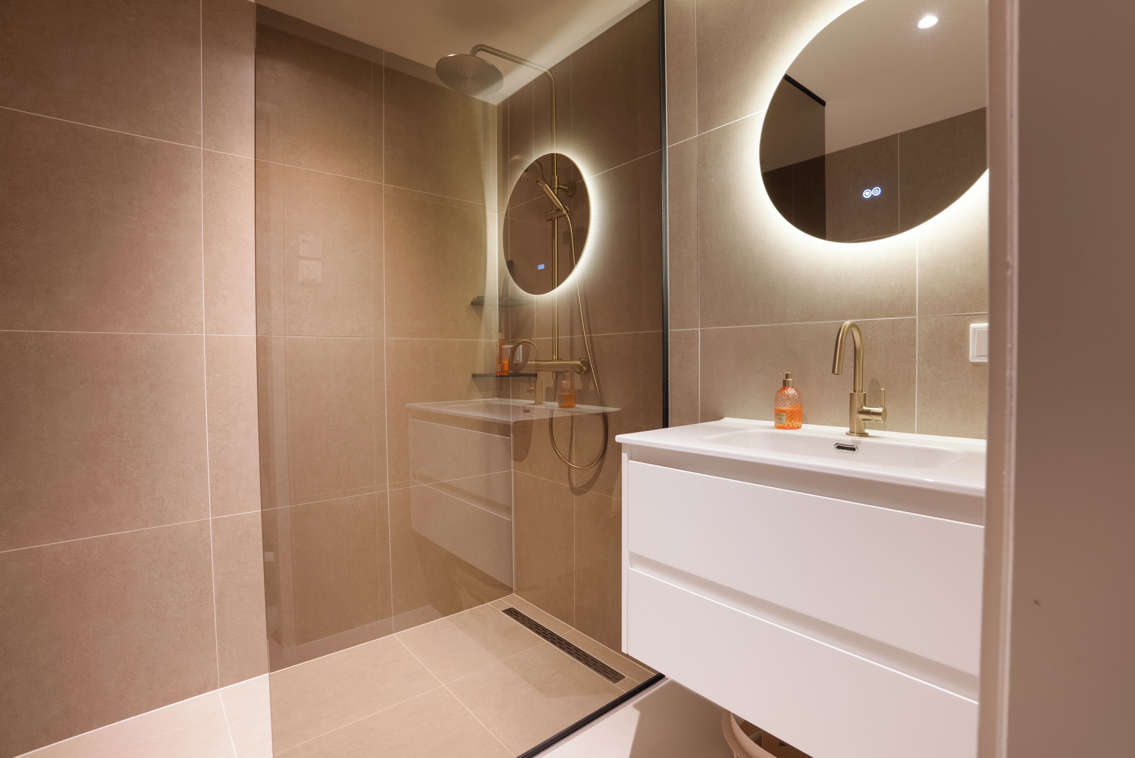 Shower, towels, soap, toilet paper