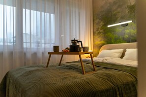 1 habitación, tabla de planchar con plancha, wifi gratis y ropa de cama 