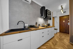 Fridge, microwave, stovetop, cookware/dishes/utensils