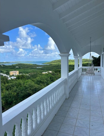 Property grounds. Relaxing,modern& exclusive oceanview Villa. 3BR+2BA.Sleeps 6.Close to everything